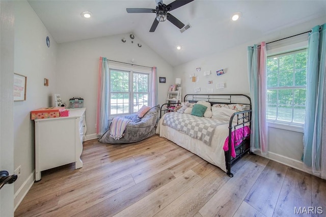 10660 Fawn Rdg, Rolla, MO 65401 - bedroom with multiple windows, light wood-style flooring, lofted ceiling, and recessed lighting