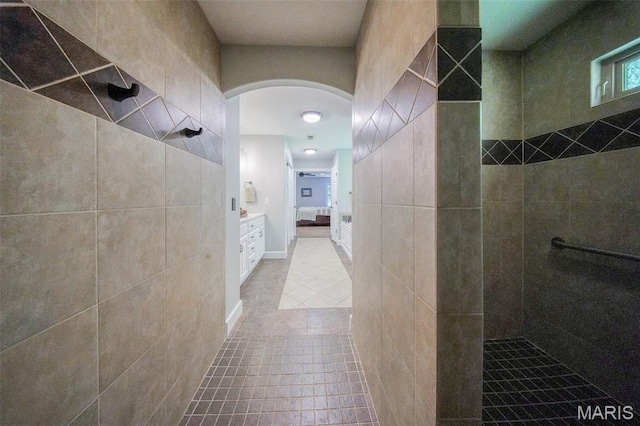10660 Fawn Rdg, Rolla, MO 65401 - bathroom with a walk in shower, tile patterned floors, and vanity