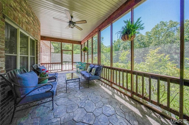 10660 Fawn Rdg, Rolla, MO 65401 - sunroom featuring ceiling fan and outdoor lounge area