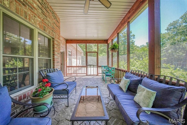 10660 Fawn Rdg, Rolla, MO 65401 - sunroom / solarium featuring an outdoor hangout area and a ceiling fan