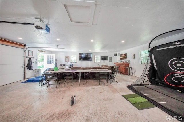 10660 Fawn Rdg, Rolla, MO 65401 - garage with a garage door opener and recessed lighting