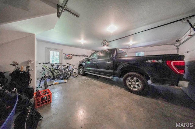 10660 Fawn Rdg, Rolla, MO 65401 - garage featuring a garage door opener