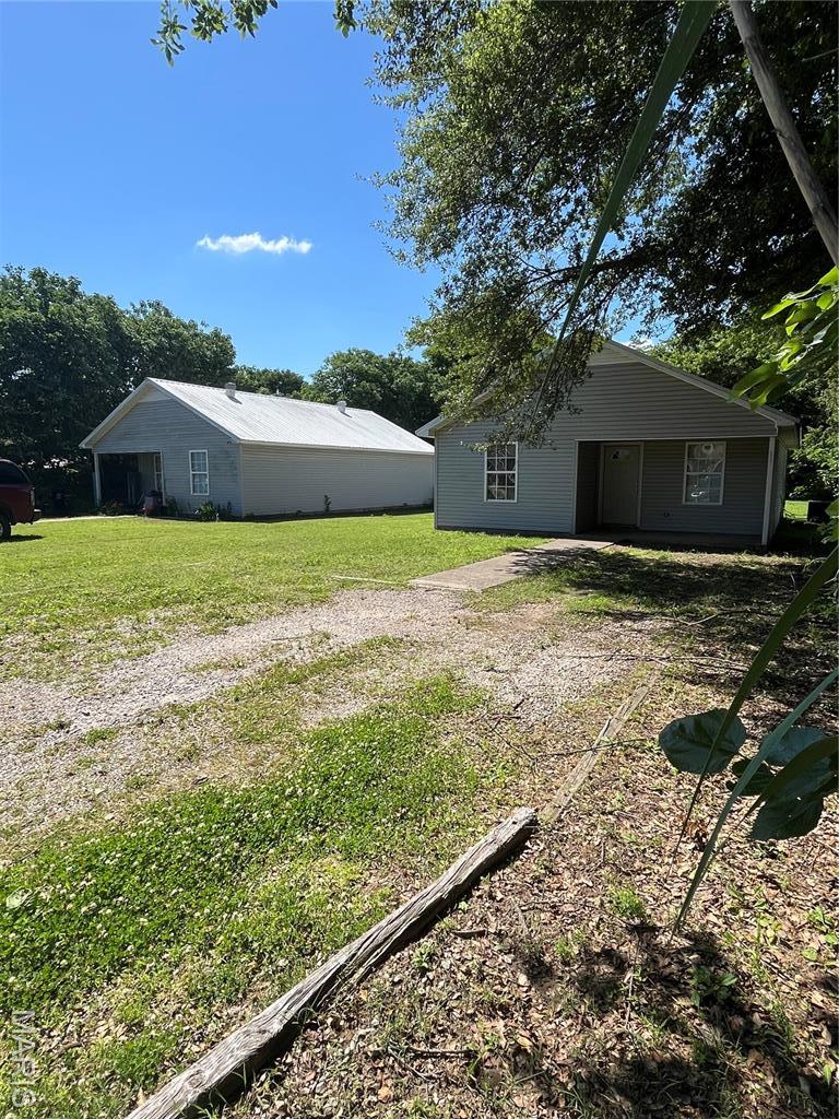 1917 Dunklin St, Kennett, MO 63857 - view of grassy yard