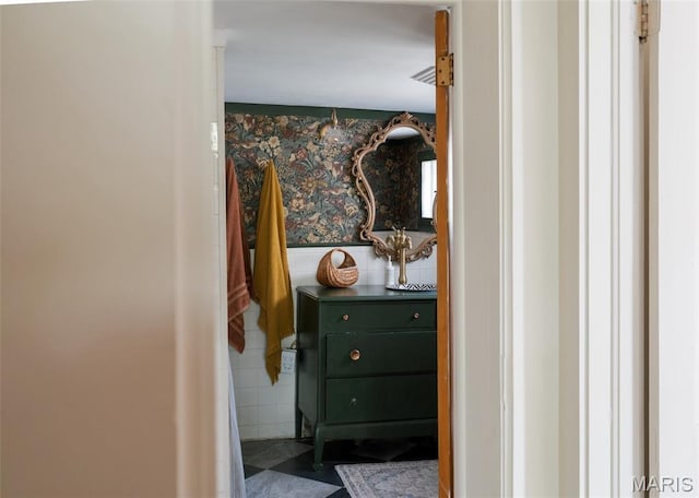 124 W Ross St, Palmyra, MO 63461 - hall with a wainscoted wall and wallpapered walls