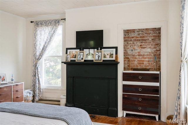 124 W Ross St, Palmyra, MO 63461 - bedroom featuring wood finished floors and ornamental molding