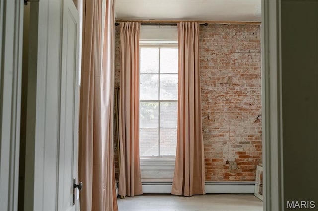 124 W Ross St, Palmyra, MO 63461 - detailed view of brick wall and wood finished floors