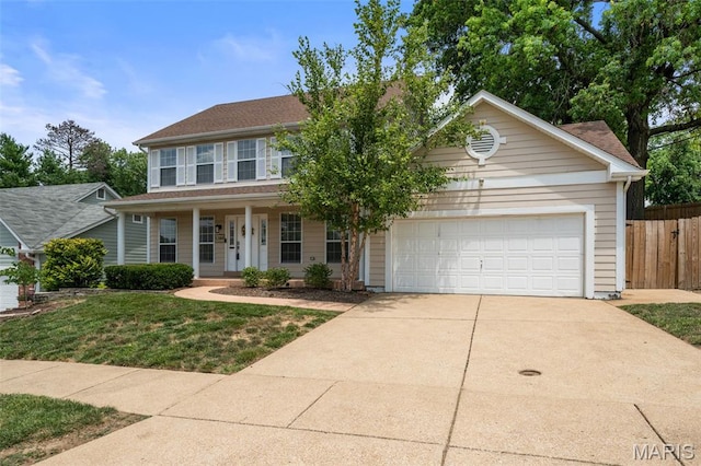 12101 Fahrpark Ln, Saint Louis, MO 63146 - colonial-style house featuring driveway, an attached garage, and covered porch