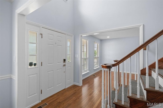 12101 Fahrpark Ln, Saint Louis, MO 63146 - foyer with wood-type flooring and stairs