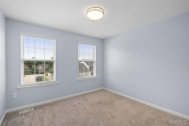 12101 Fahrpark Ln, Saint Louis, MO 63146 - carpeted spare room with baseboards