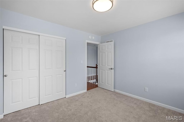 12101 Fahrpark Ln, Saint Louis, MO 63146 - unfurnished bedroom featuring carpet and a closet