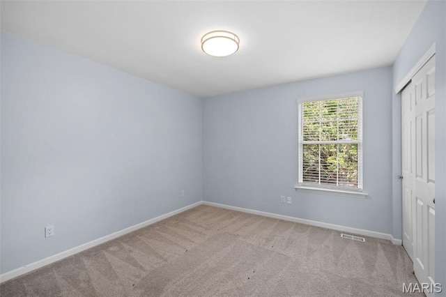 12101 Fahrpark Ln, Saint Louis, MO 63146 - unfurnished bedroom with a closet and carpet floors