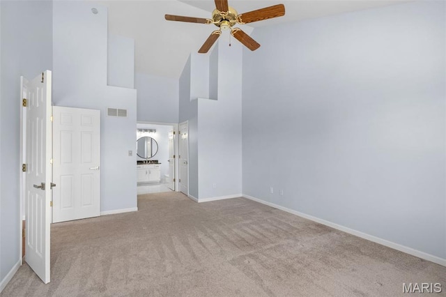 12101 Fahrpark Ln, Saint Louis, MO 63146 - unfurnished bedroom featuring high vaulted ceiling, carpet, and ensuite bath