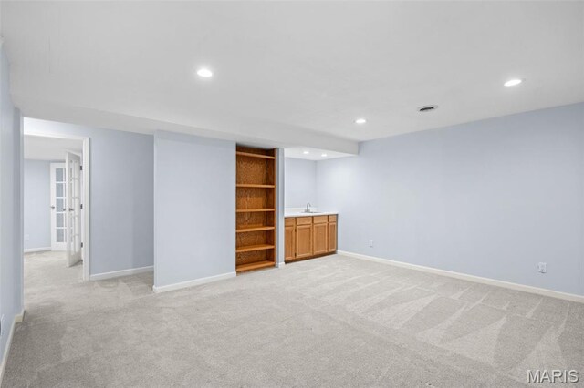 12101 Fahrpark Ln, Saint Louis, MO 63146 - finished basement featuring light carpet and recessed lighting