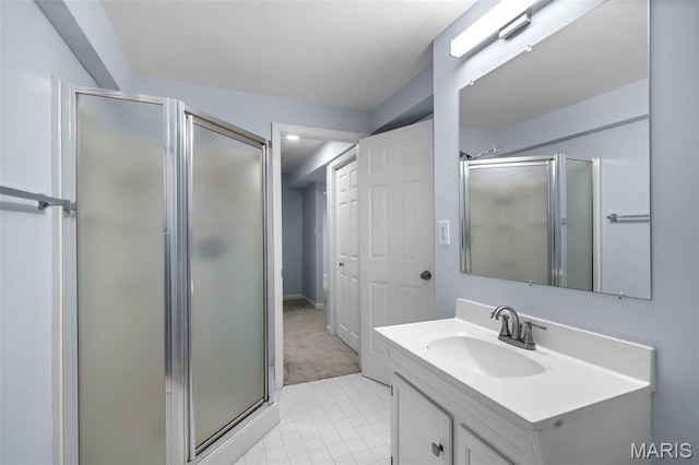 12101 Fahrpark Ln, Saint Louis, MO 63146 - bathroom featuring a stall shower, vanity, and tile patterned floors
