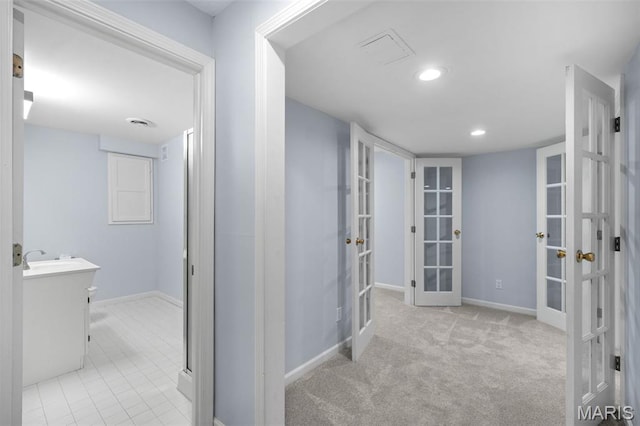 12101 Fahrpark Ln, Saint Louis, MO 63146 - corridor with french doors and recessed lighting