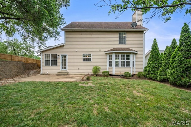 12101 Fahrpark Ln, Saint Louis, MO 63146 - back of house with a patio area, a chimney, and entry steps
