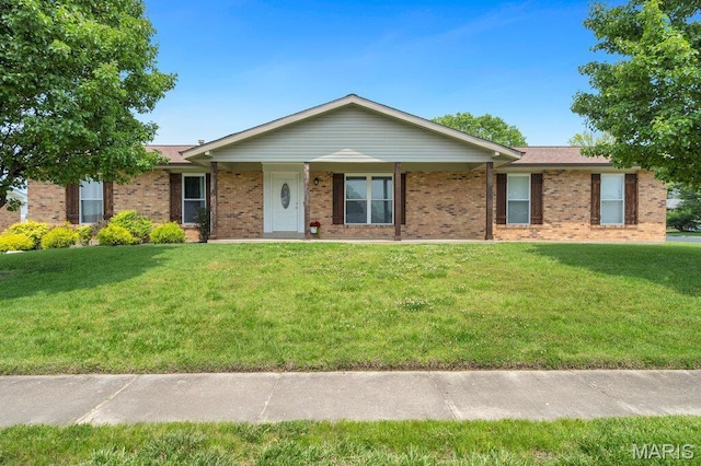 3100 Tally Ho Dr, Saint Charles, MO 63301 - ranch-style house featuring a front yard and brick siding