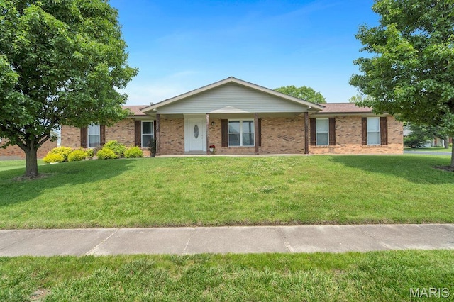 3100 Tally Ho Dr, Saint Charles, MO 63301 - single story home with a front yard and brick siding
