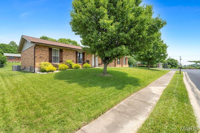 3100 Tally Ho Dr, Saint Charles, MO 63301 - view of front facade featuring brick siding and a front yard
