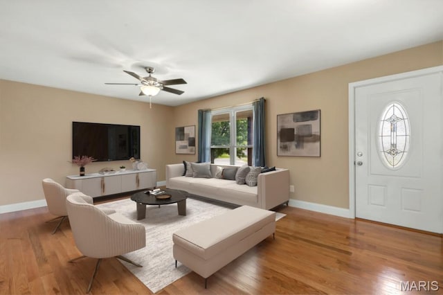 3100 Tally Ho Dr, Saint Charles, MO 63301 - living area with light wood-style flooring and a ceiling fan