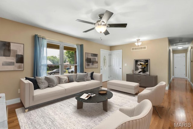 3100 Tally Ho Dr, Saint Charles, MO 63301 - living room featuring a ceiling fan and wood finished floors