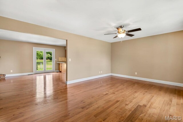 3100 Tally Ho Dr, Saint Charles, MO 63301 - spare room with light wood finished floors and ceiling fan