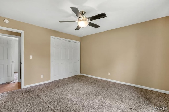 3100 Tally Ho Dr, Saint Charles, MO 63301 - unfurnished bedroom with carpet flooring, a closet, and a ceiling fan