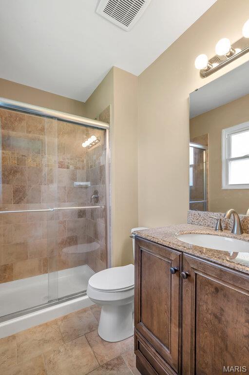 3100 Tally Ho Dr, Saint Charles, MO 63301 - full bath with vanity and a stall shower