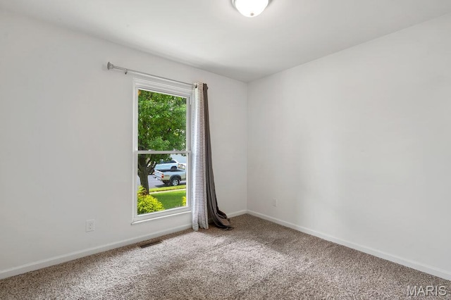 3100 Tally Ho Dr, Saint Charles, MO 63301 - carpeted empty room featuring baseboards