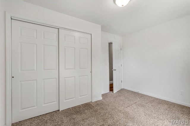 3100 Tally Ho Dr, Saint Charles, MO 63301 - unfurnished bedroom featuring carpet flooring and a closet