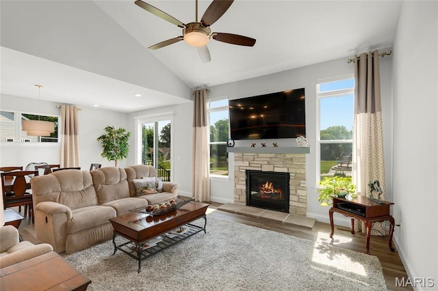 145 Royal Inverness Pkwy, Dardenne Prairie, MO 63368 - living area featuring wood finished floors, a ceiling fan, a fireplace, and high vaulted ceiling