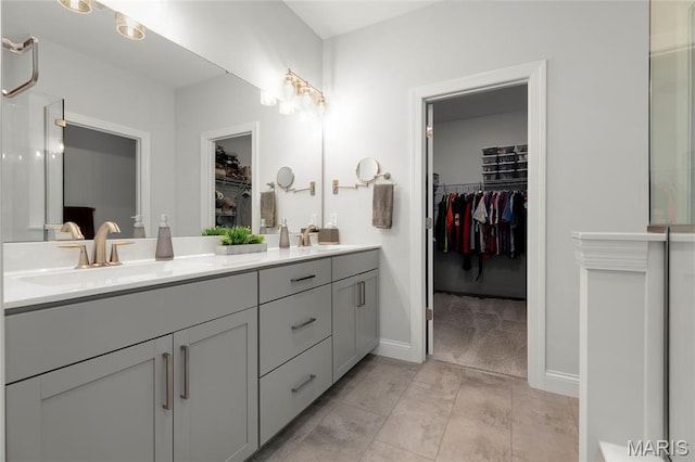 145 Royal Inverness Pkwy, Dardenne Prairie, MO 63368 - bathroom featuring double vanity and a spacious closet