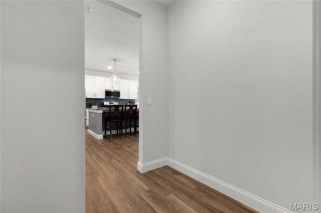 145 Royal Inverness Pkwy, Dardenne Prairie, MO 63368 - corridor featuring wood finished floors and recessed lighting