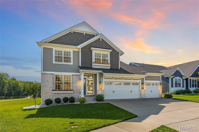 145 Royal Inverness Pkwy, Dardenne Prairie, MO 63368 - view of front of house with a front lawn, concrete driveway, a garage, and brick siding