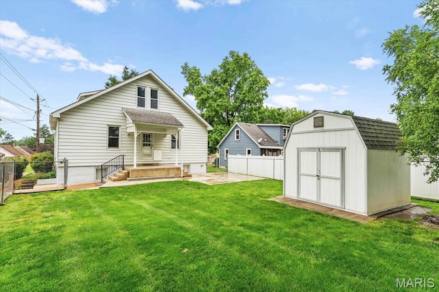 542 S Main St, Waterloo, IL 62298 - back of house featuring a patio and a gambrel roof