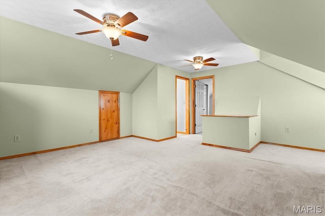 542 S Main St, Waterloo, IL 62298 - bonus room with a ceiling fan, vaulted ceiling, carpet flooring, and baseboards