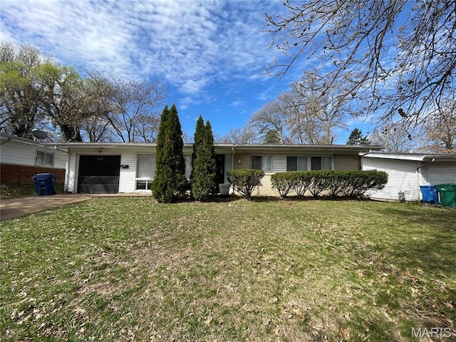 415 Waterford Dr, Florissant, MO 63033 - ranch-style home with an attached garage, a front lawn, brick siding, and concrete driveway