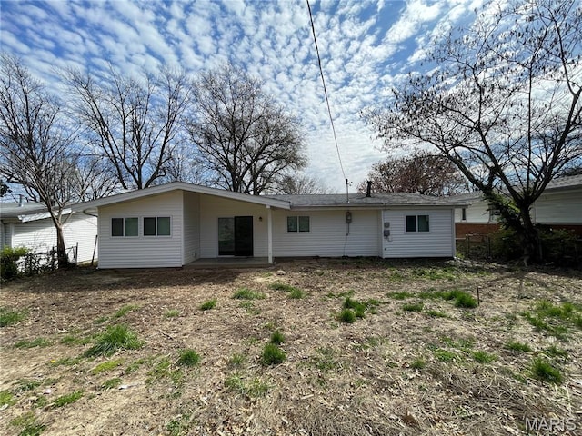 415 Waterford Dr, Florissant, MO 63033 - rear view of house with a patio