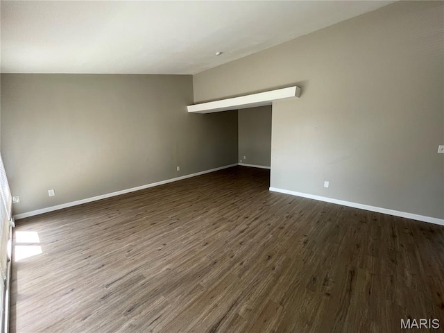 415 Waterford Dr, Florissant, MO 63033 - empty room with dark wood finished floors and baseboards