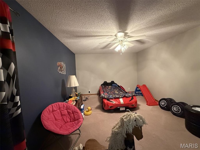 106 Woodland Hills Ct, Vandalia, IL 62471 - carpeted bedroom with a textured ceiling and a ceiling fan