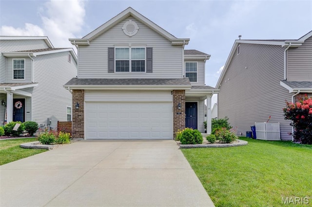 3325 Charlestowne Crossing Dr, Saint Charles, MO 63301 - view of front of property featuring brick siding, an attached garage, a front lawn, and driveway