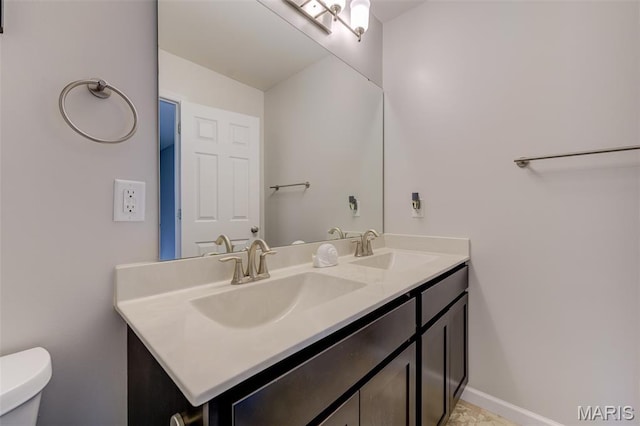 3325 Charlestowne Crossing Dr, Saint Charles, MO 63301 - bathroom featuring double vanity and toilet