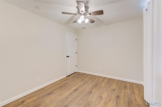 3325 Charlestowne Crossing Dr, Saint Charles, MO 63301 - empty room with a ceiling fan and light wood-style floors
