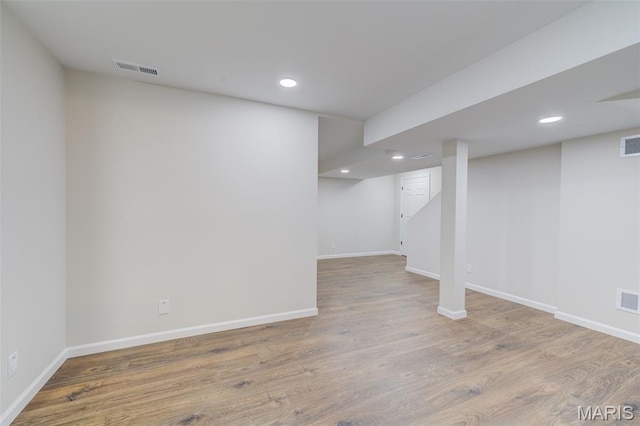 3325 Charlestowne Crossing Dr, Saint Charles, MO 63301 - finished below grade area with recessed lighting and wood finished floors