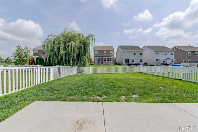 3325 Charlestowne Crossing Dr, Saint Charles, MO 63301 - fenced backyard featuring a residential view and a patio area