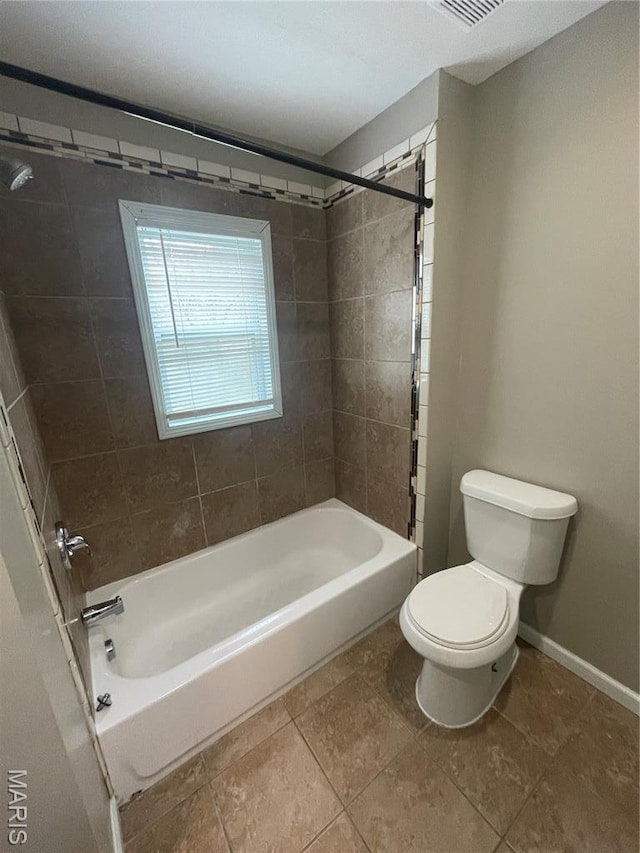 6155 Emerald Ave, Saint Louis, MO 63135 - bathroom featuring bathing tub / shower combination and tile patterned floors