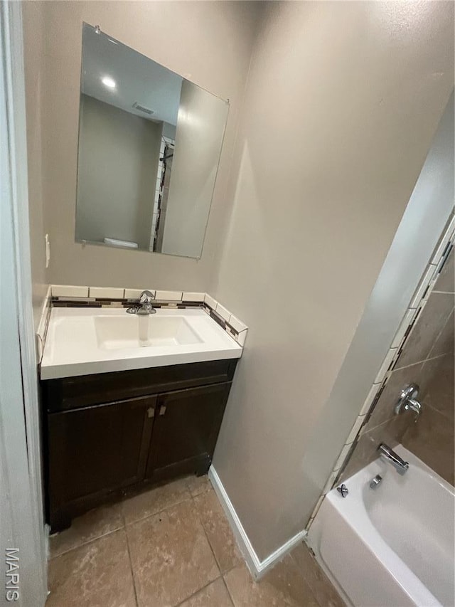 6155 Emerald Ave, Saint Louis, MO 63135 - bathroom with vanity, bathing tub / shower combination, and tile patterned flooring