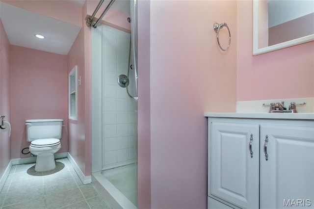 5736 Old Keebler Rd, Collinsville, IL 62234 - bathroom featuring toilet, a shower stall, vanity, baseboards, and tile patterned flooring