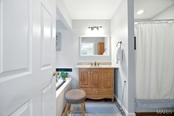 9 Sun Trail, Rise Trail, MO 63050 - full bathroom with vanity, a shower with shower curtain, and a bathtub