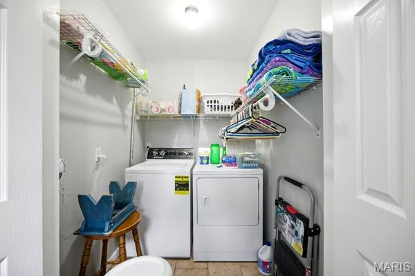 9 Sun Trail, Rise Trail, MO 63050 - washroom featuring washing machine and dryer and tile patterned flooring